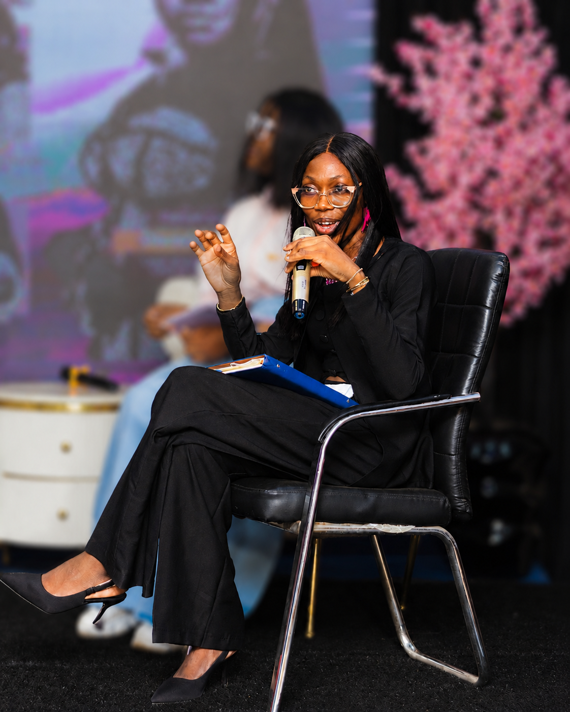 Margaret Akinwumi speaking at a fashion business conference